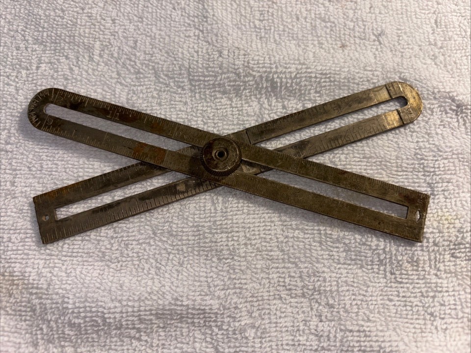 A genuine mid-century '12-in-1' carpenter's pocket tool made in Nashville with a patent mark — the kind of ingenious American craftsmanship you just don't see anymore.