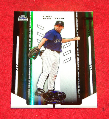 TODD HELTON ROCKIES 2004 LEAF CERTIFIED MATERIALS #181 MIRROR WHITE 063/100 (B2)
