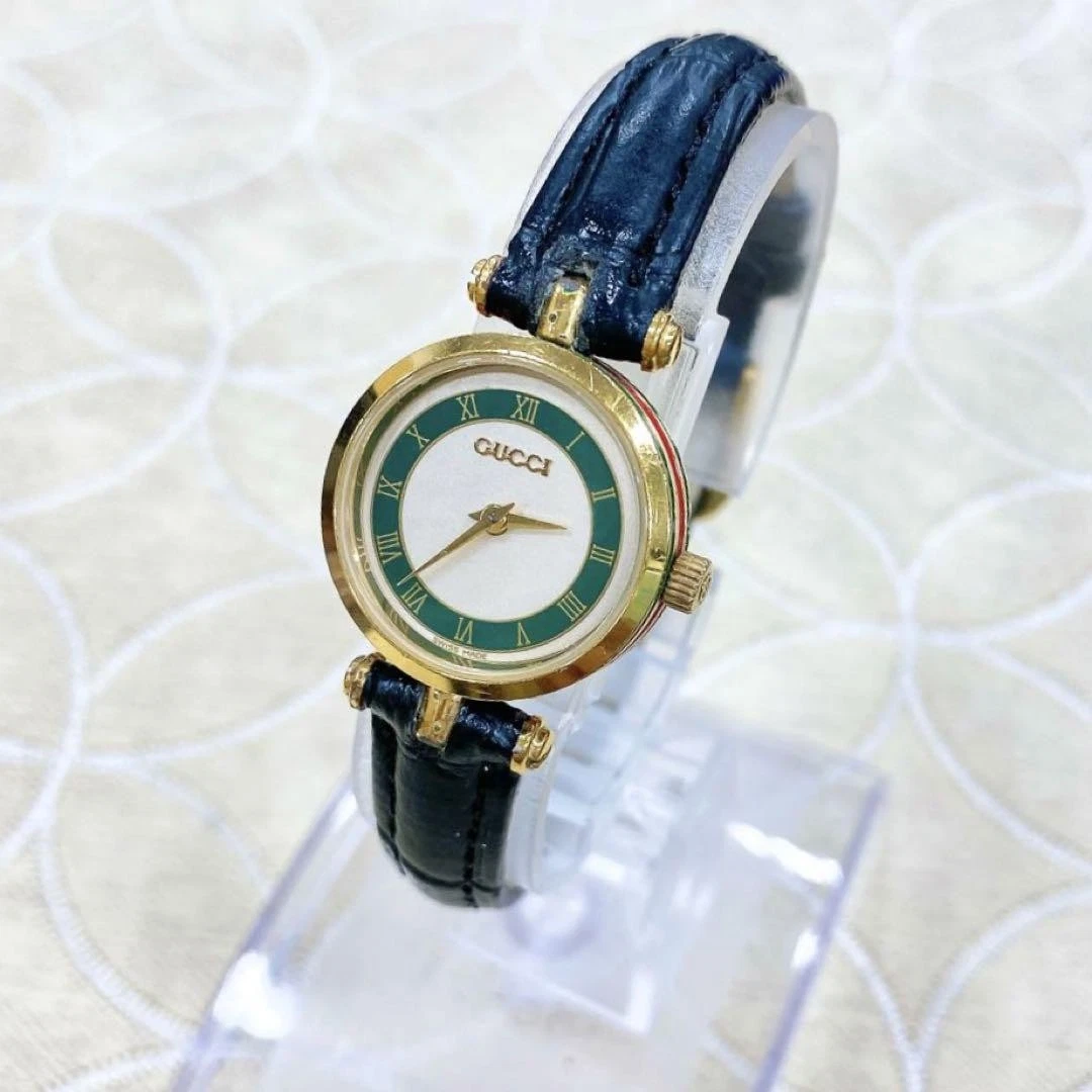 Montre Gucci 2000L Sherry Line verte   Style ancien, très bon état