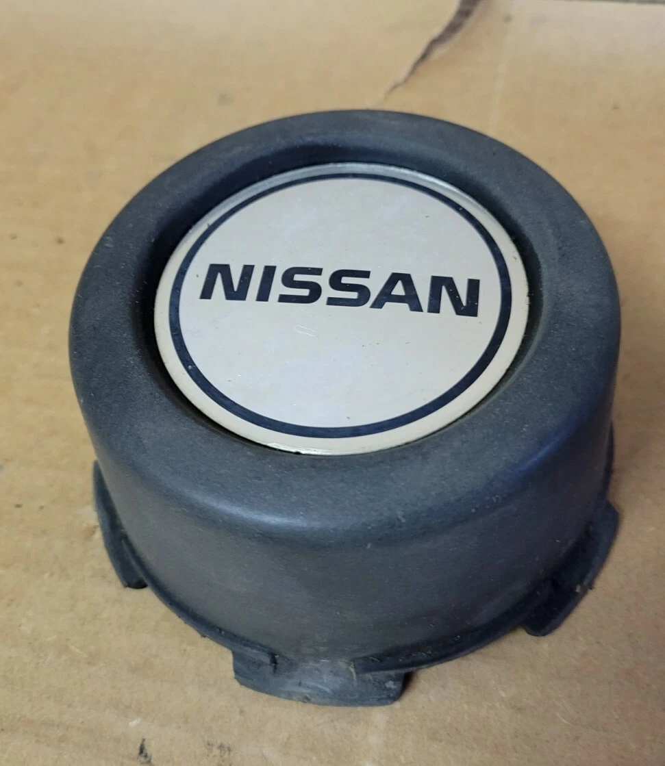 Nissan hardbody center caps deals