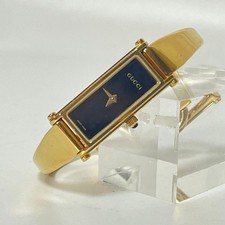 GUCCI 1500L Bangle Watch Women's Quartz Gold Black Dial Rectangle Wristwatch