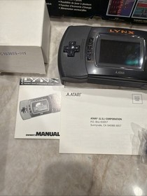 Atari Lynx 2 Handheld In Original Box Powers Up, Sound Works, Screen Issue.