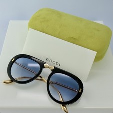 Gucci GG0307S 56mm Foldable Aviator Sunglasses with Blue Lens Gold Arms Crystal