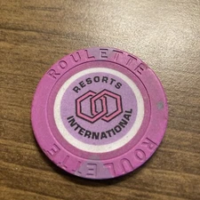 $1   Resorts International Purple roulette casino chip atlantic city super rare