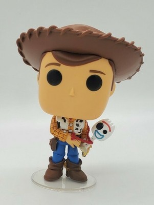 sheriff woody holding forky funko pop