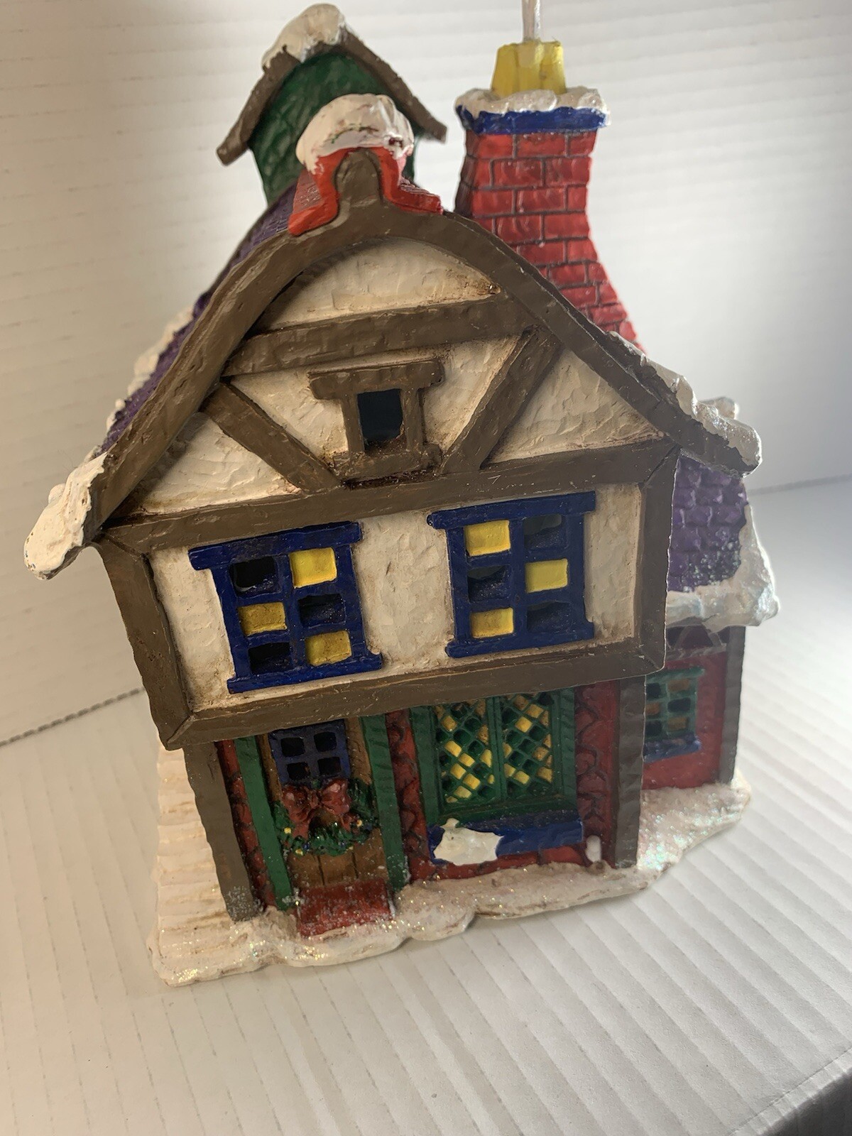 Dillards Illuminated Christmas House with Festive Lights