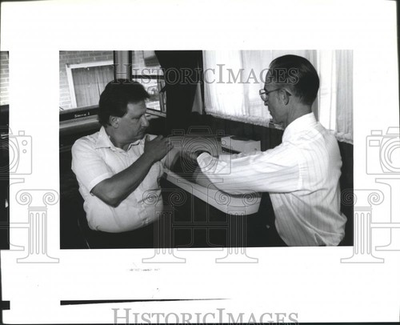 #ad 1992 Press Photo Ben Stiles checks blood pressure of John Boniol of St. Bernard $23.88