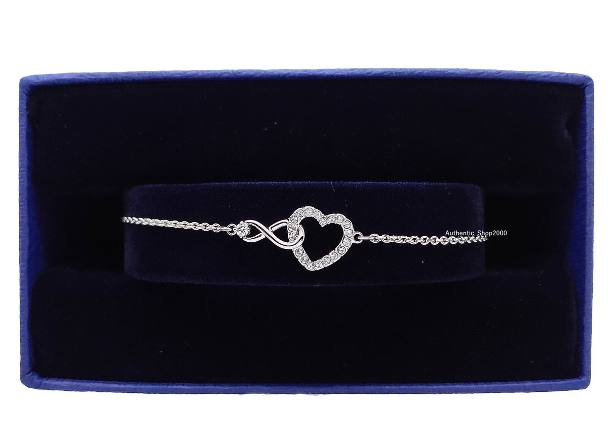 100% Auth SWAROVSKI Rhodium Sparkle Crystals Infinity Heart 100% Auth SWAROVSKI Rhodium Sparkle Crystals Infinity Heart