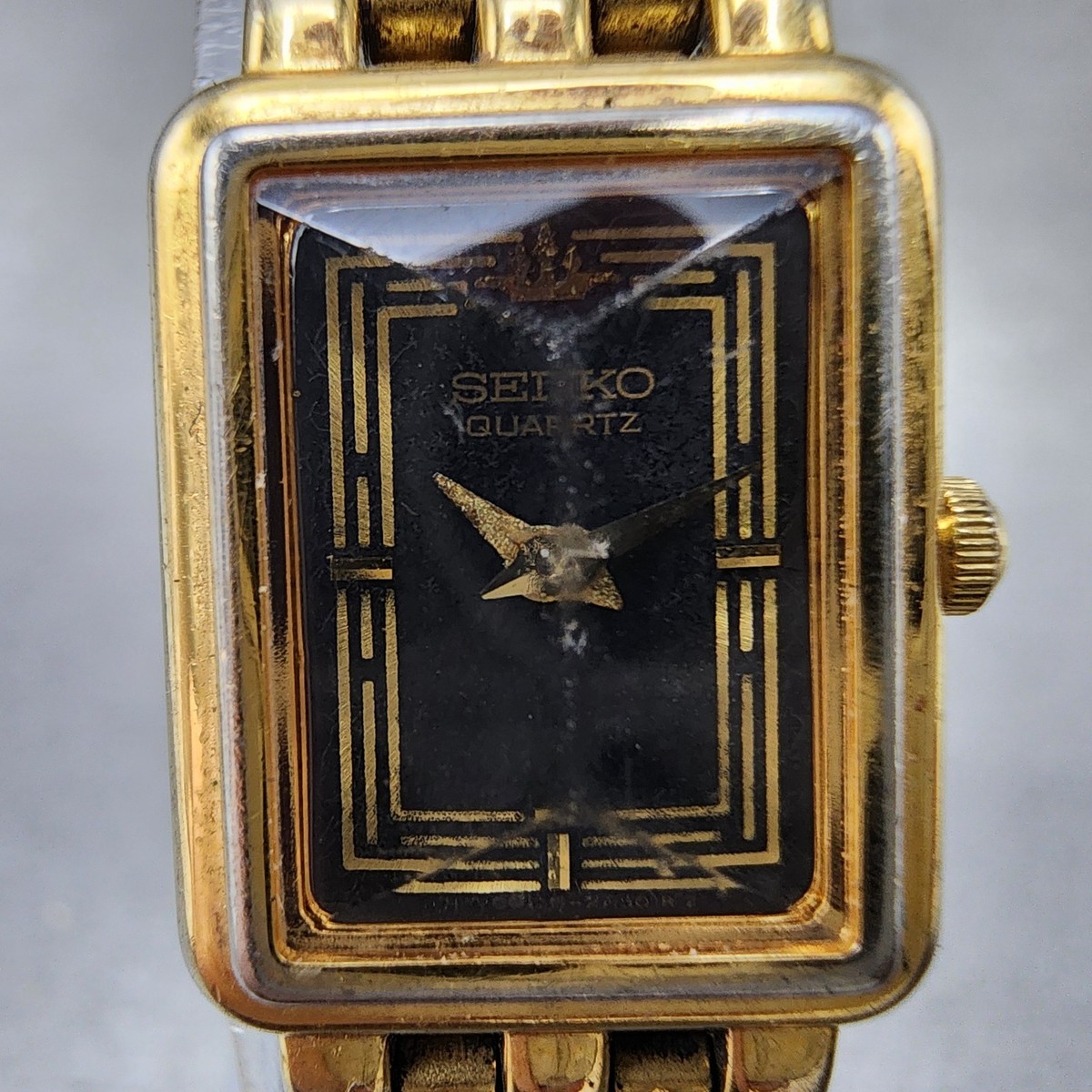 Seiko Tank Watch Women 16mm Black Dial Gold Tone Rectangle 1n00