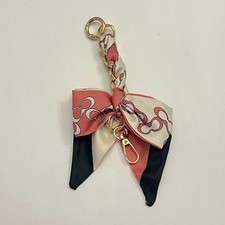Bow tie Bag Charm Pink and white, gold chain Unbranded