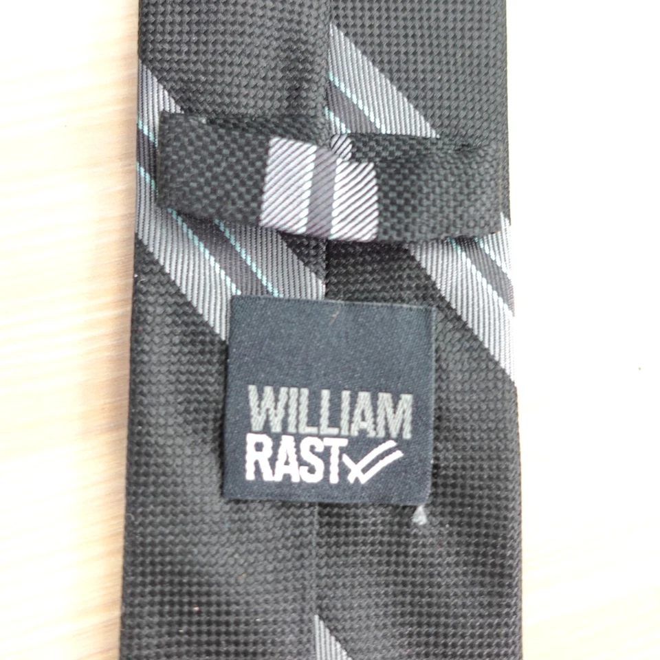 Corbata de cuello ajustada para hombre a rayas negras seda texturizada diseñador moderno WILLIAM RAST Foto 4 de 4