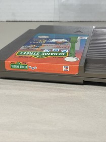 SESAME STREET ABC LETTER GO ROUND, ERNIES BIG SPLASH NINTENDO NES CART ONLY
