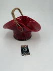 Fenton Art Glass Mandarin Red basket with woven handle and embossed base.