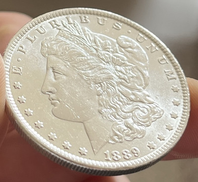Morgan Silber Dollar 1889 in Kapsel mit Glanz