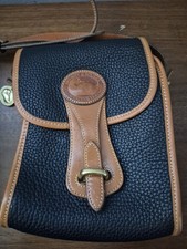 vintage Dooney  Bourke Essex All Weather Leather crossbody bag.