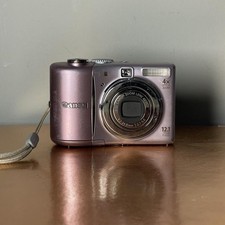 Canon PowerShot A1100 IS 12.1MP Pink Digital Camera Tested Working