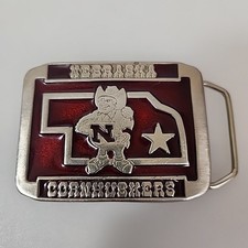 Nebraska Cornhuskers belt buckle by Xalcaco U20 Used 1980's 3" X 2.25" Red
