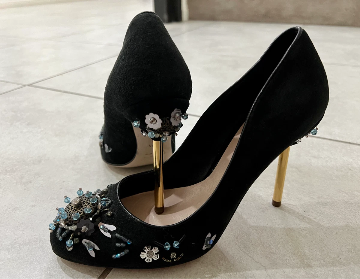 Black and sales gold stilettos