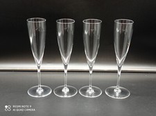 4 flutes à Champagne en cristal de BACCARAT ,modèle Dom Pérignon, signé,H 23,5cm