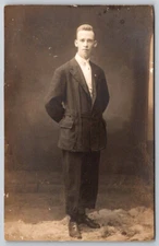 Studio Portrait Man in Suit Jacket Standing Real Photo RPPC Postcard