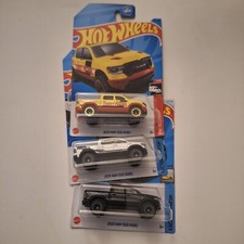 Hot Wheels 2020 Ram 1500 Rebel   3 Trucks With Treasure & White & Black