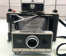 Vintage Polaroid Automatic 340 Land Camera Silver Folding -Pre-Owned -Not Tested