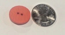 DILL BUTTONS #284503 ORANGE TEXTURED ROUND- 2 HOLE-- 9 BUTTONS IN A SET