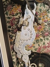 large studded black leather headstall with spoon Spade mouthpiece horse bit 