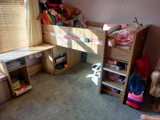 Cabin bed with pull out desk and cupboard