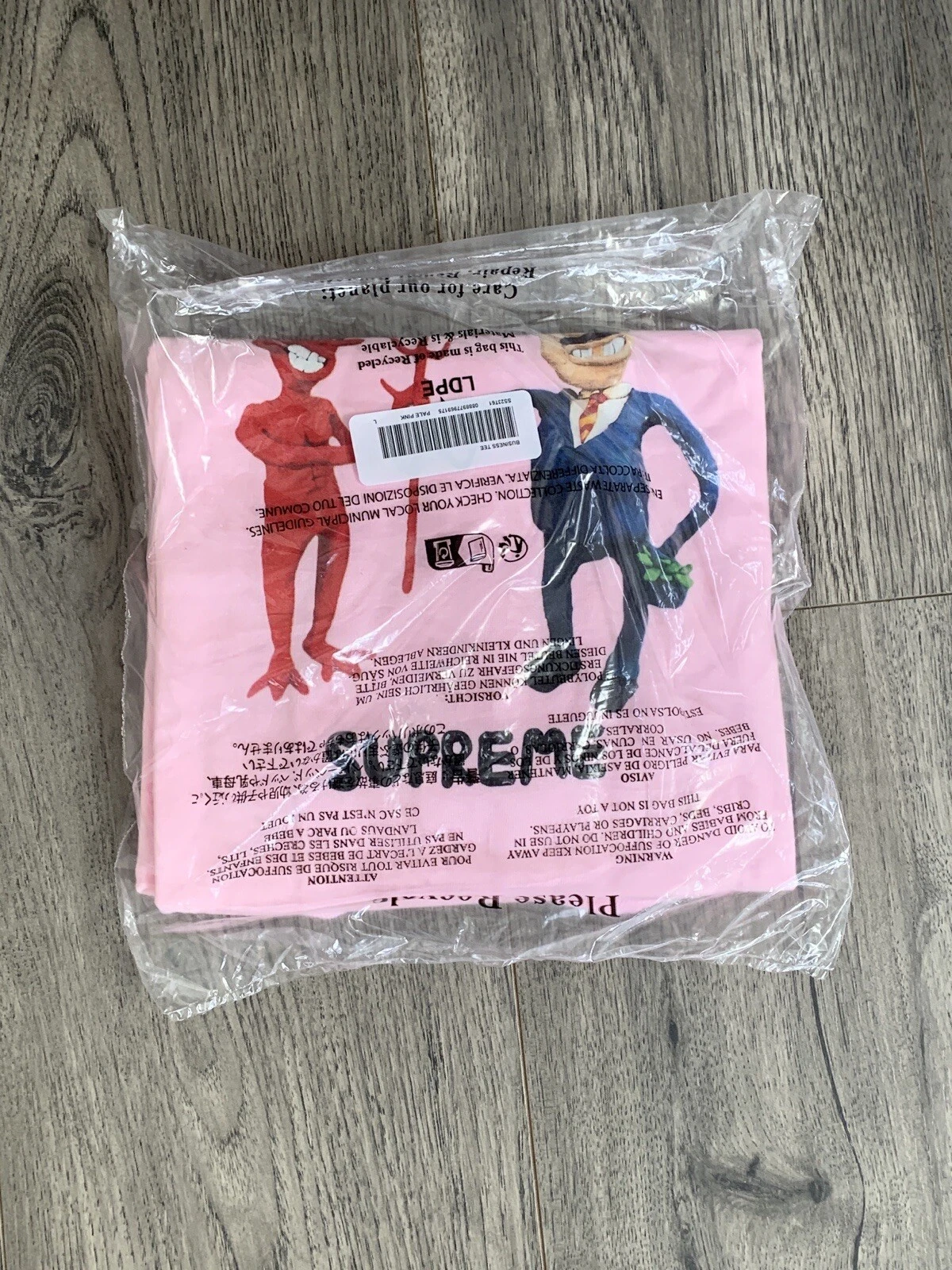 T shirt Supreme Business grand rose flambant neuf 