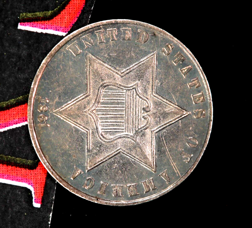 1861-3-Cent-Silver-Has-Obverse-Shield-Behind-III-On-Reverse-Of-Coin?