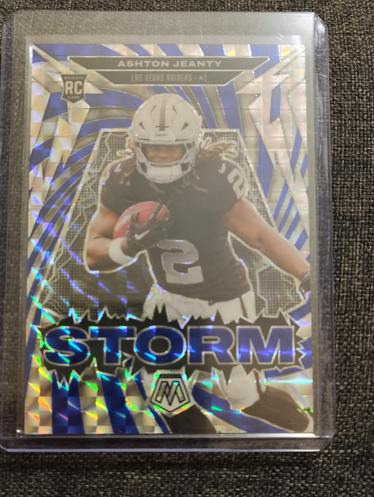 2025 Panini Mosaic Storm Blue Prizm Ashton Jeanty RC Raiders #3/99