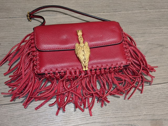 small red clutch bag