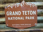 VINTAGE GRAND TETON PORCELAIN SIGN OLD NATIONAL PARK SERVICE NPS WYOMING CABINS