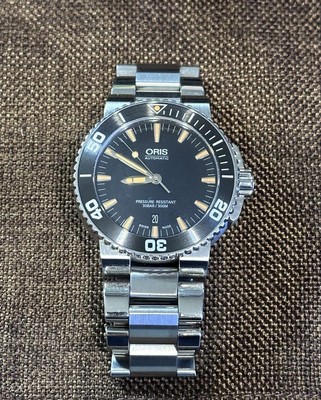 ORIS Aquis Date Automatic Mens Watch Black Orange Dial Silver Bracelet