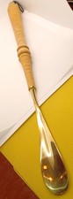 NICE WOODEN SPINDLE DESIGNED FAUX BRASS SHOE HORN w/LOOP TO HANG IT----19 3/8" L