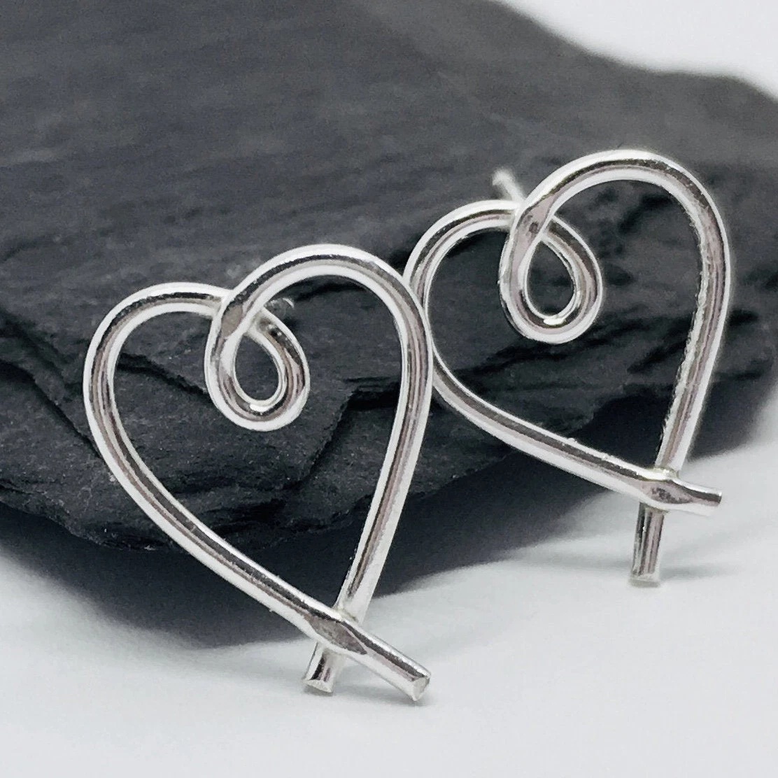 Modern silver stud earrings deals