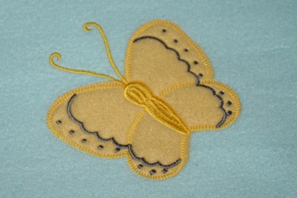 Manta de bebé azul aguamarina suave verde polar amarillo mariposa borde cosido Lovey Foto 2 de 4