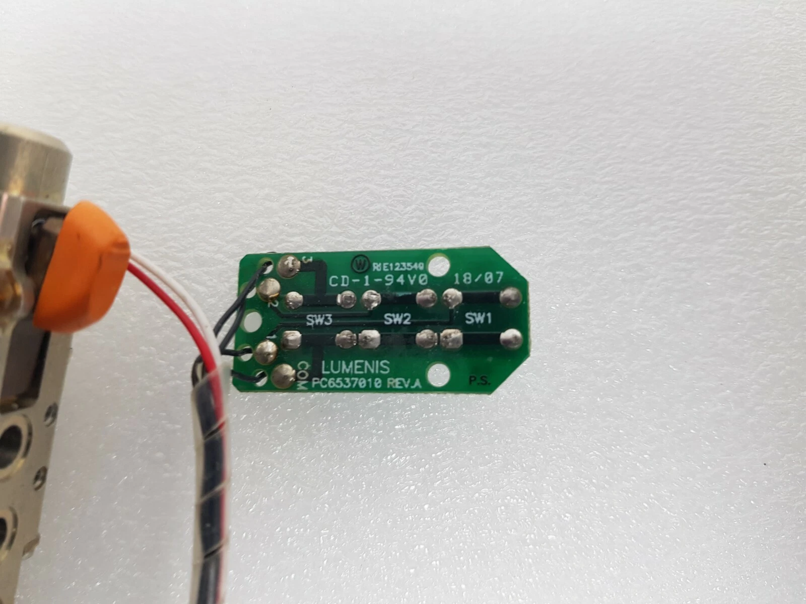 Solder side of the switch board printed LUMENIS PC6537010 REV.A with SW1, SW2, SW3 and COM pads