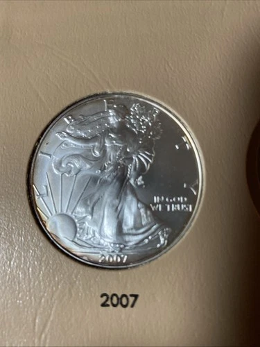 2007-W American Silver Eagle Burnished Uncirculated with Natural Toning On Edge