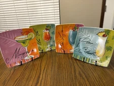 Set Of 4 8-1/2” Square Mixed Drink Plates.