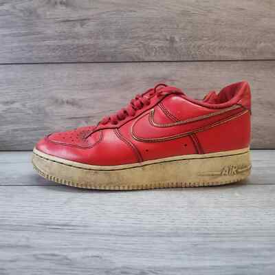 red and gold nike trainers