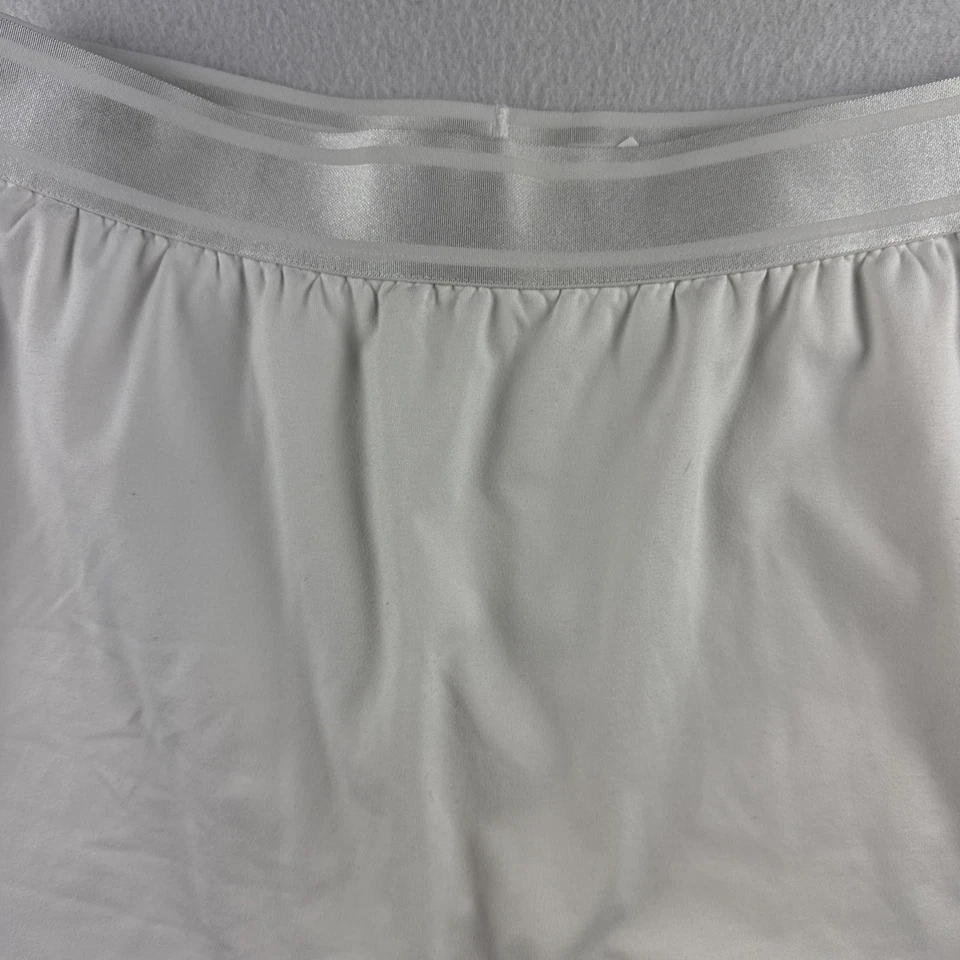 Pantalón corto de tenis Nike Dri Fit blanco negro talla grande juvenil Foto 3 de 4