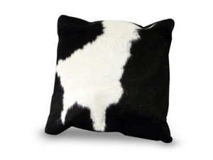 white cowhide pillow