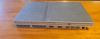 PlayStation 2 Slim Console Silver (SCPH-77001) FOR PARTS, TURNS ON READ ISSUES