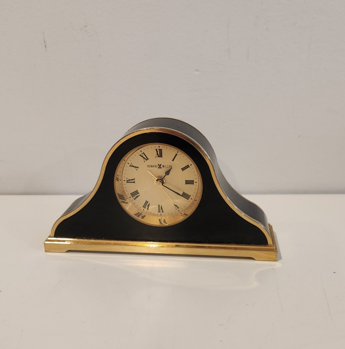 Vintage Clock Howard Miller Alarm Mantle Desk Gold Tone Black Roman Numerals MCM