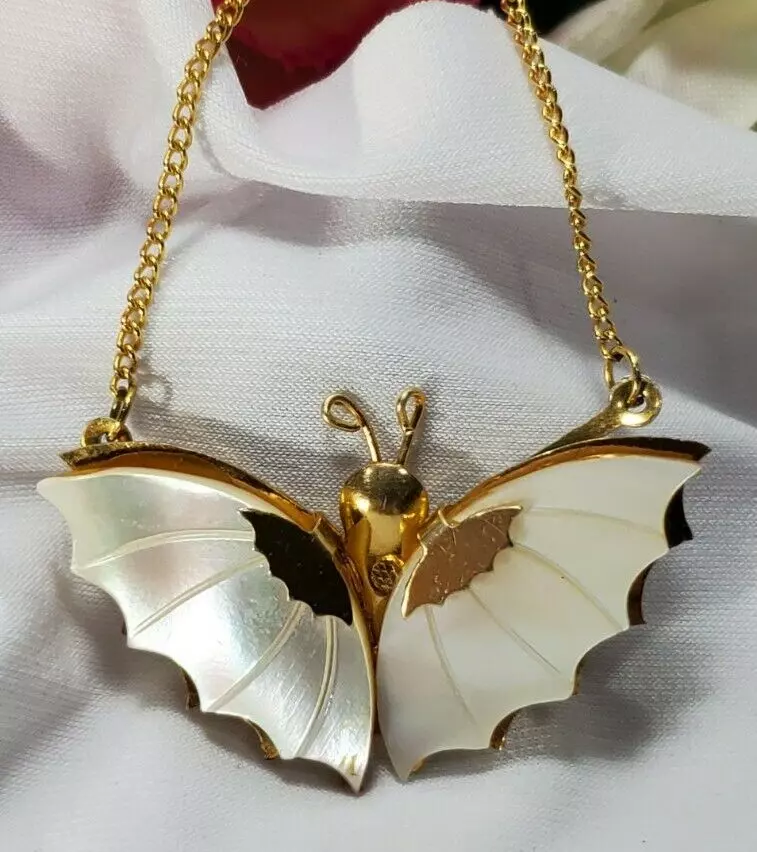 Antique butterfly shop necklace