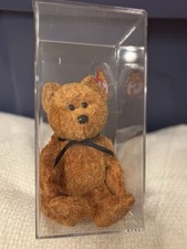 Ty Beanie Baby named Fuzz the Bear, (RARE).  With/case And Tag