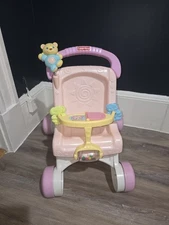 Fisher-Price Brilliant Basics Stroll Along Walker Sturdy Toy Doll Stroller