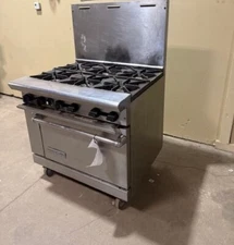 AMERICAN RANGE 6 BURNER STOVE WITH OVEN ON CASTERS
